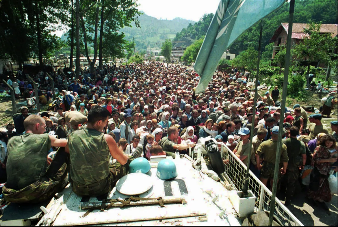 Dutch UN peacekeepers overlooking crowd